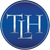 Blue circular logo with silver letters