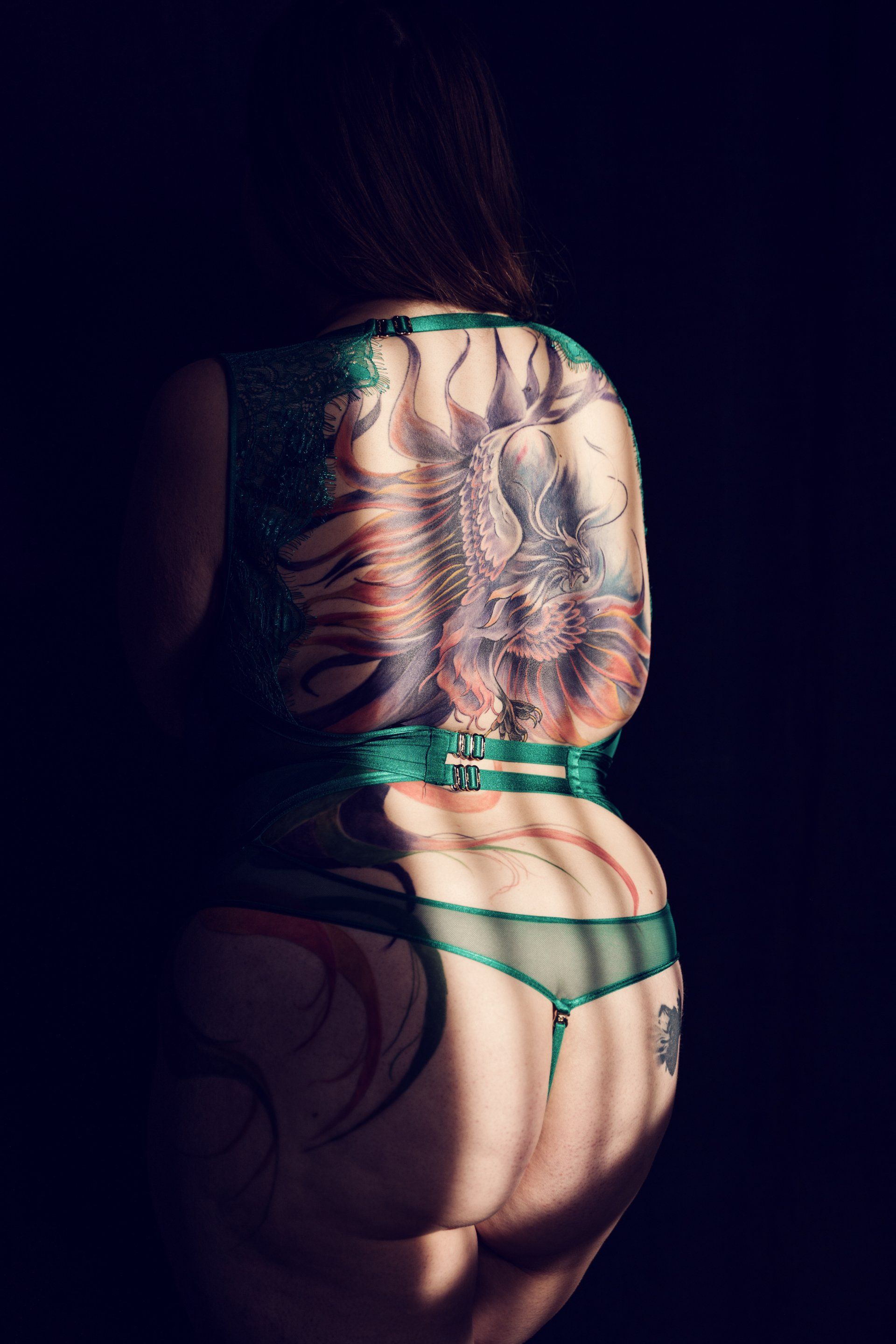 boudoir image of back tattoo