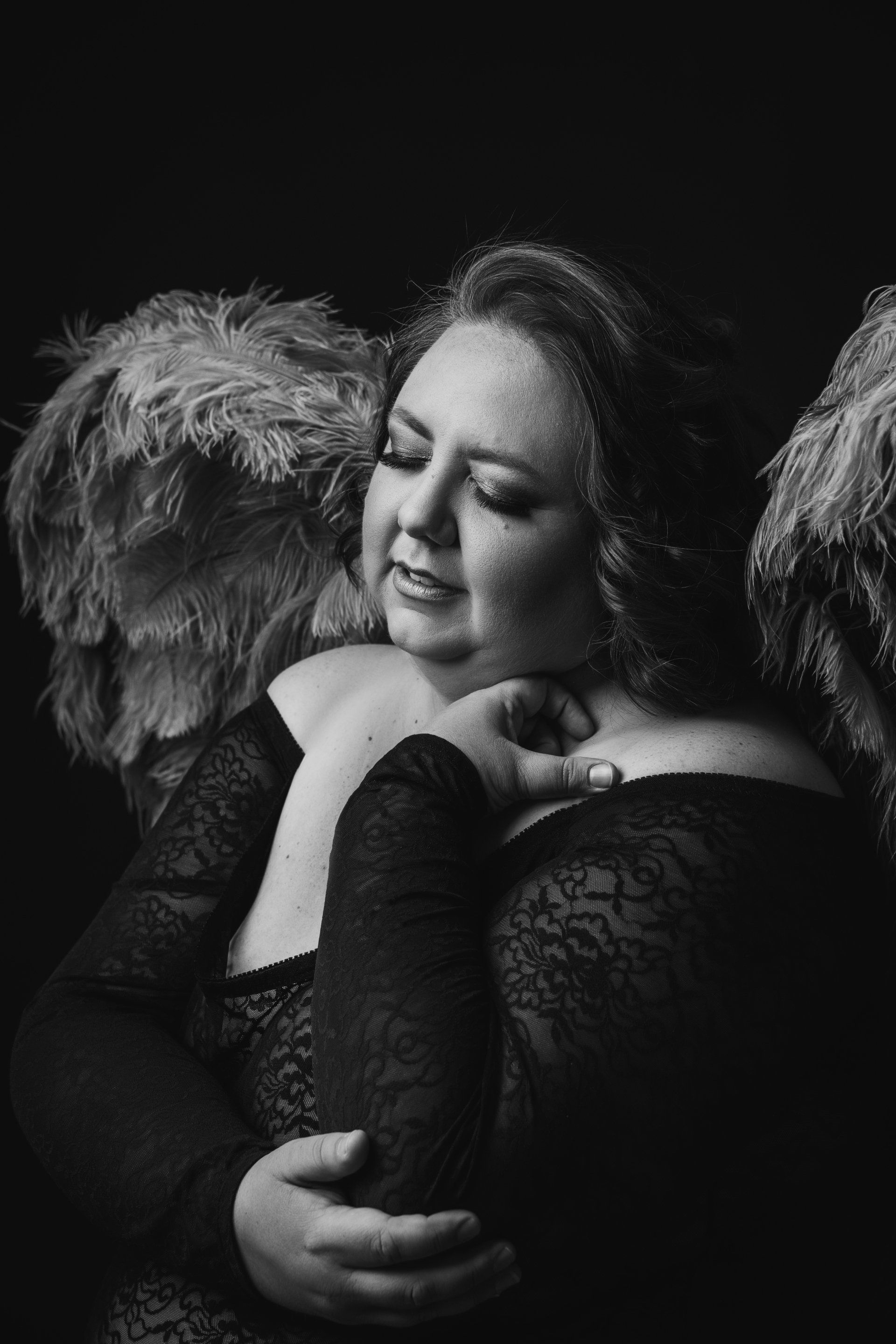 boudoir image in angel wings