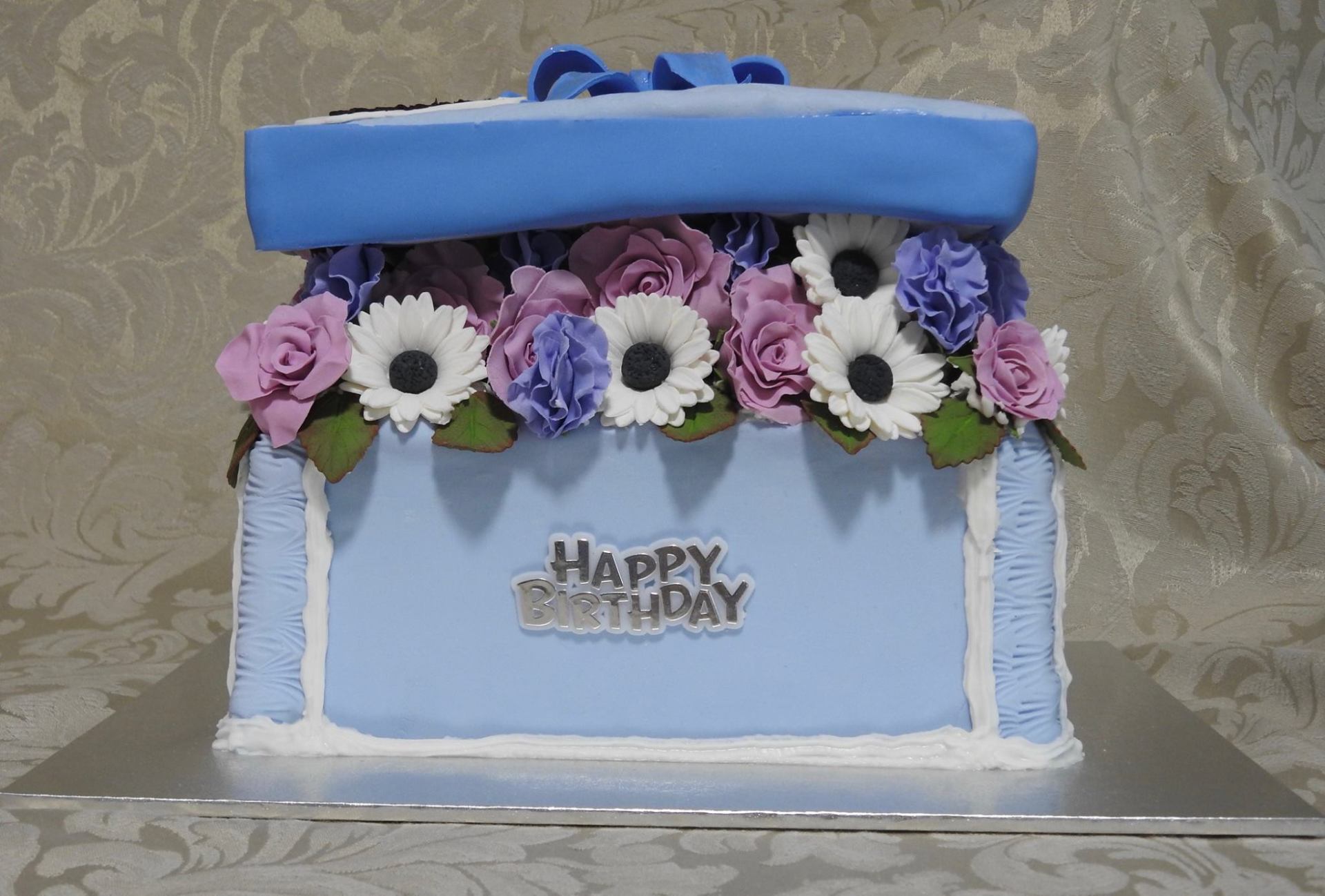 Flower Box Birthday Cake soft pastel colurs sugar roses daisies and sweet pea flowers.