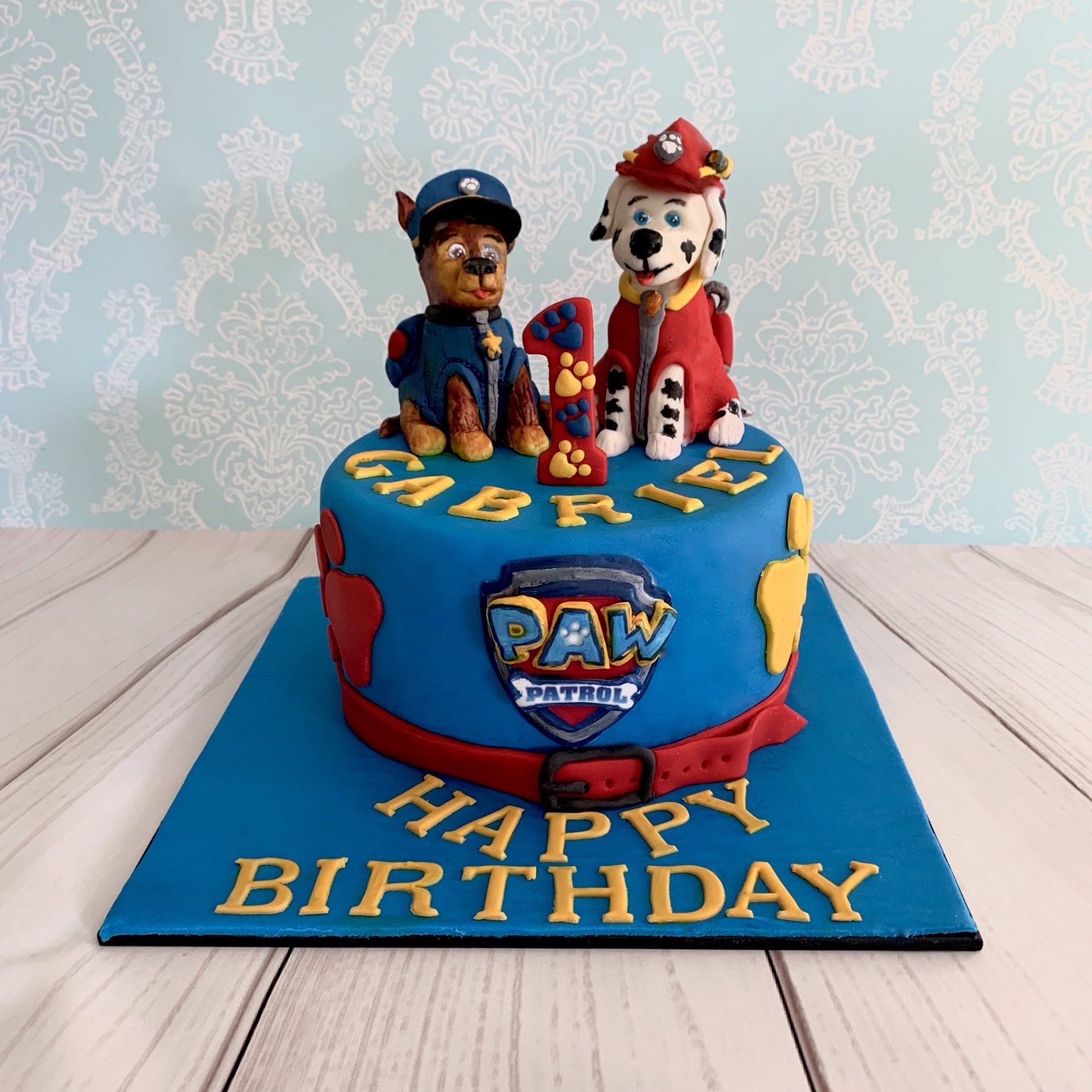 Boy's 1st Birthday with hand  scuplted dogs on top.