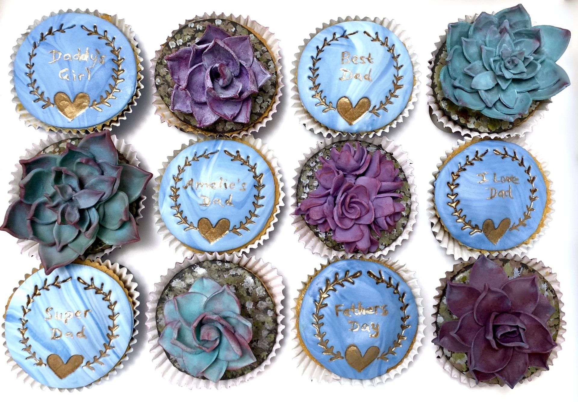Father's Day cupcakes. 6 with hand sculpted sugar succulents and 6 with hand painted father's day sentiments.