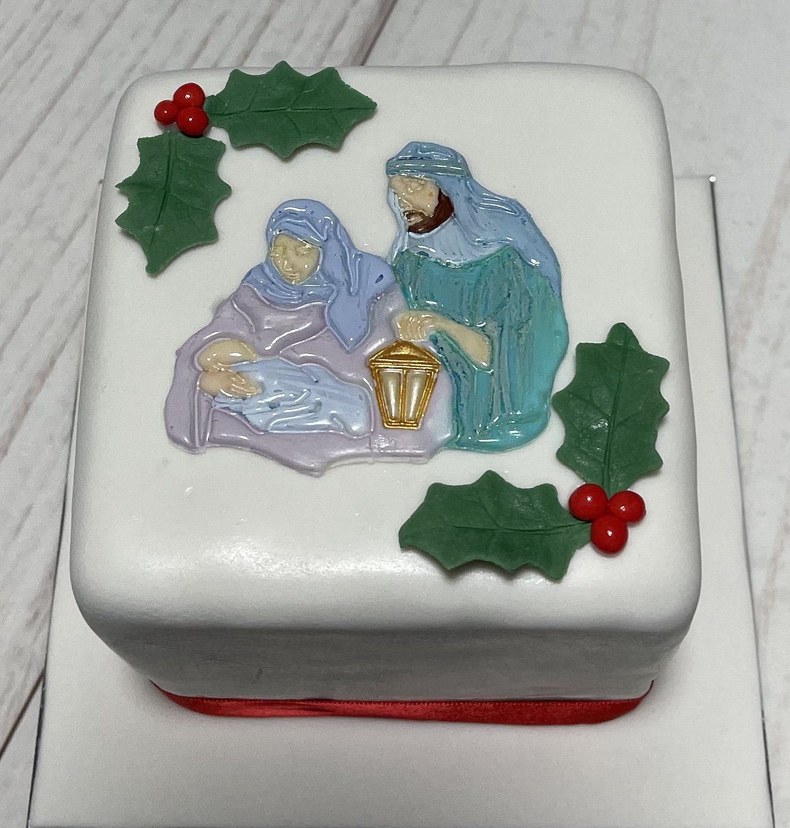 Christmas cake with Fondant Holly, And Nativity Scene