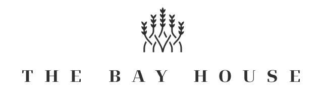 The Bay House logo with a small black tree icon above the text on a white background