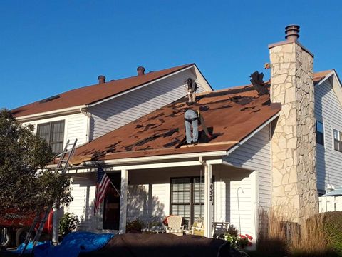 Two Workers Repairing the Roof — Beavercreek, OH — CK Lee Restorations, LLC. Two Workers Repairing the Roof — Beavercreek, OH — CK Lee Restorations, LLC.