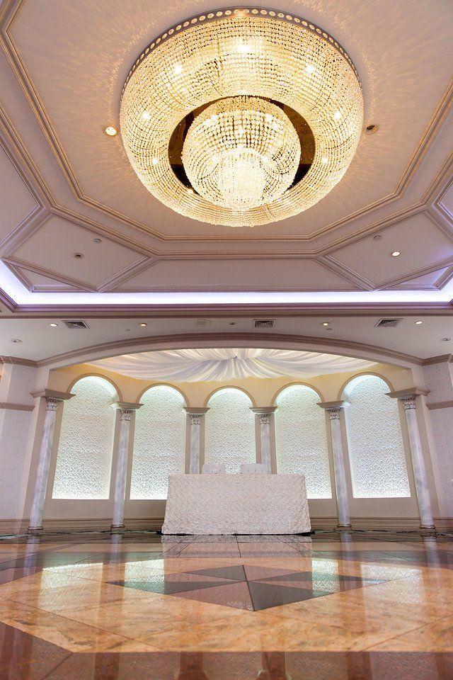 Bride & Groom Table with View of Chandelier