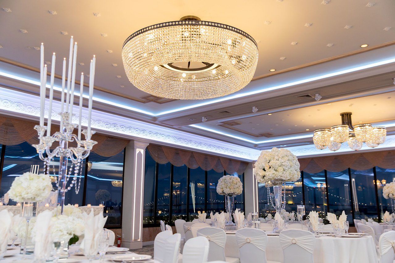 Bright & Beautiful Chandelier Above Guest Tables
