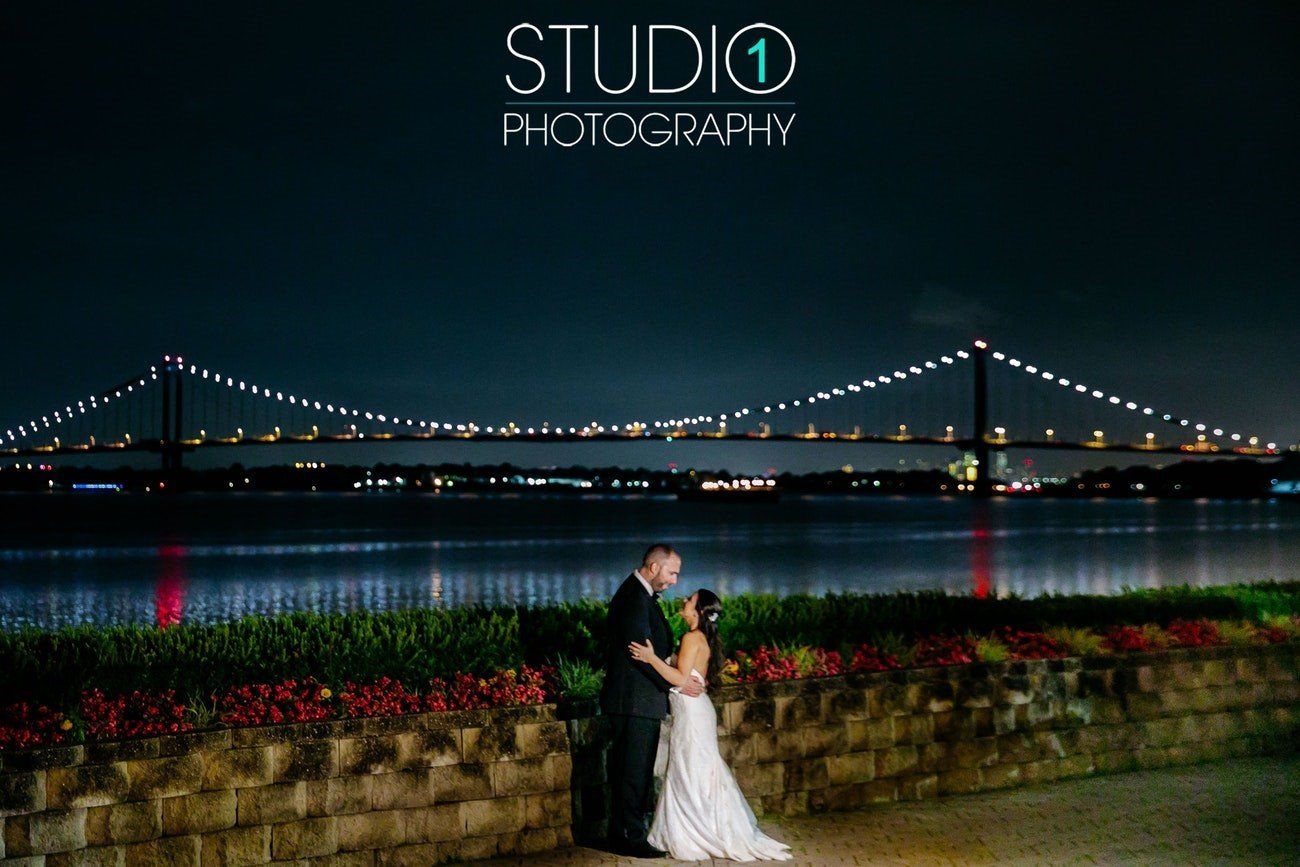 Bride & Groom In Front of Bridge