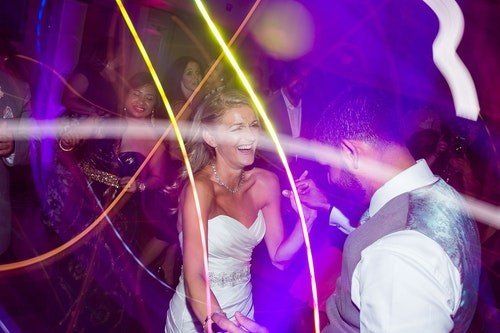 Bride Laughing on Dance Floor