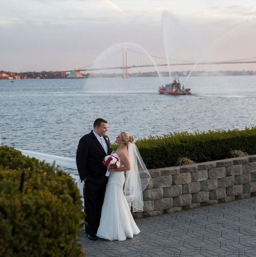 a newly married couple experiencing the breathtaking waterfont views at Marina Del Rey