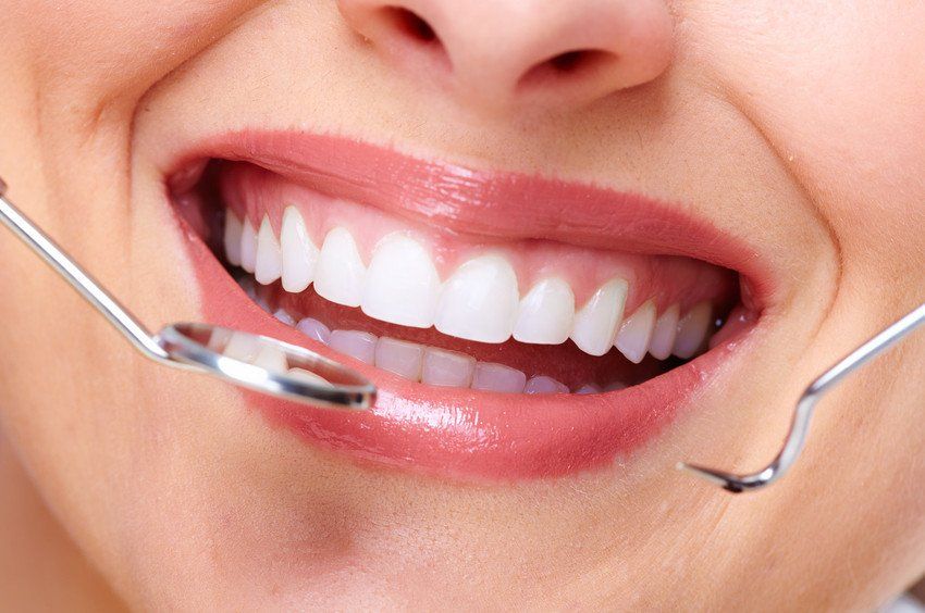 A healthy smile with dental instruments