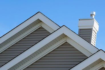 Roof with chimney and siding
