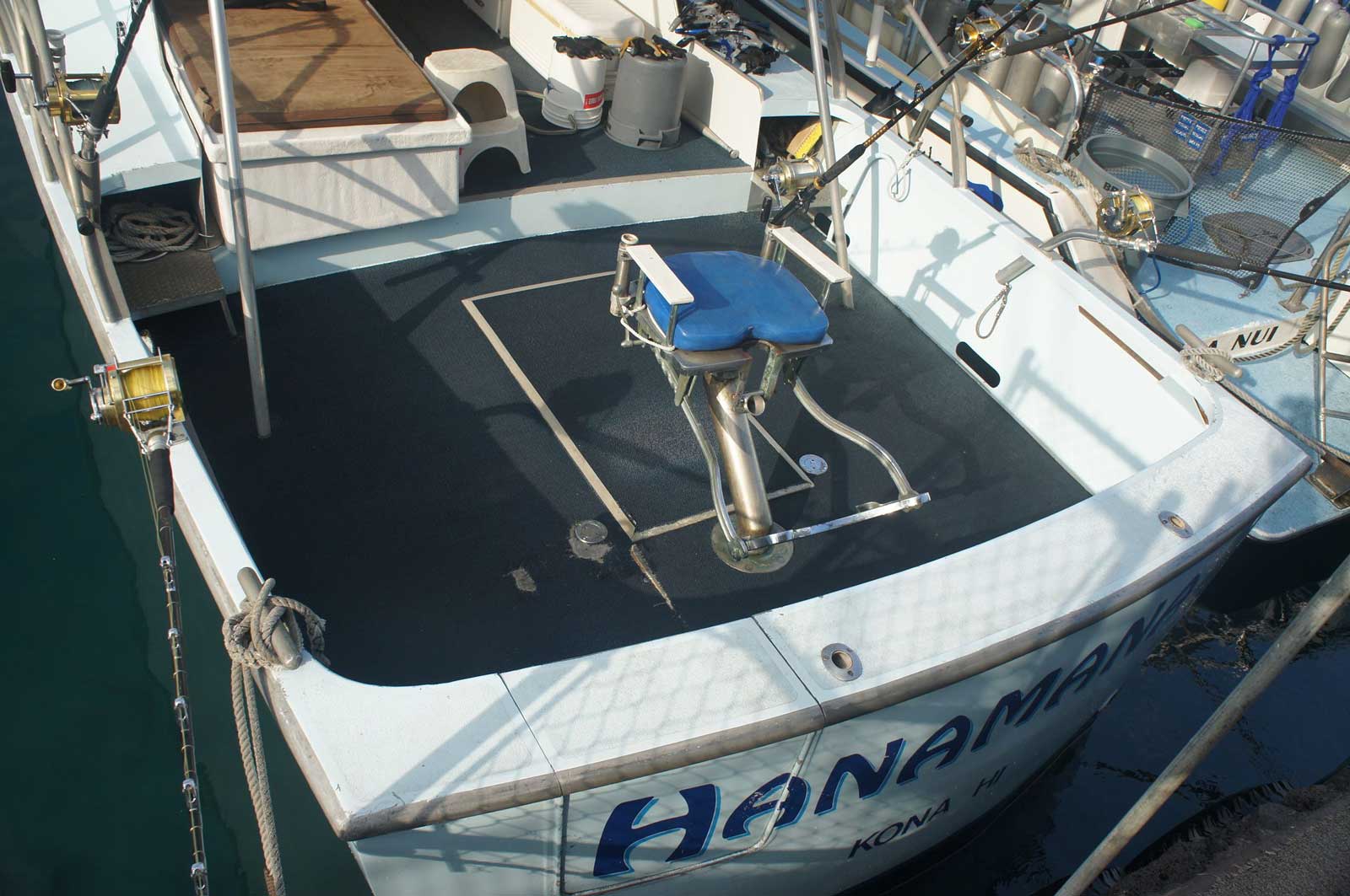 A white boat with the word hana on the side