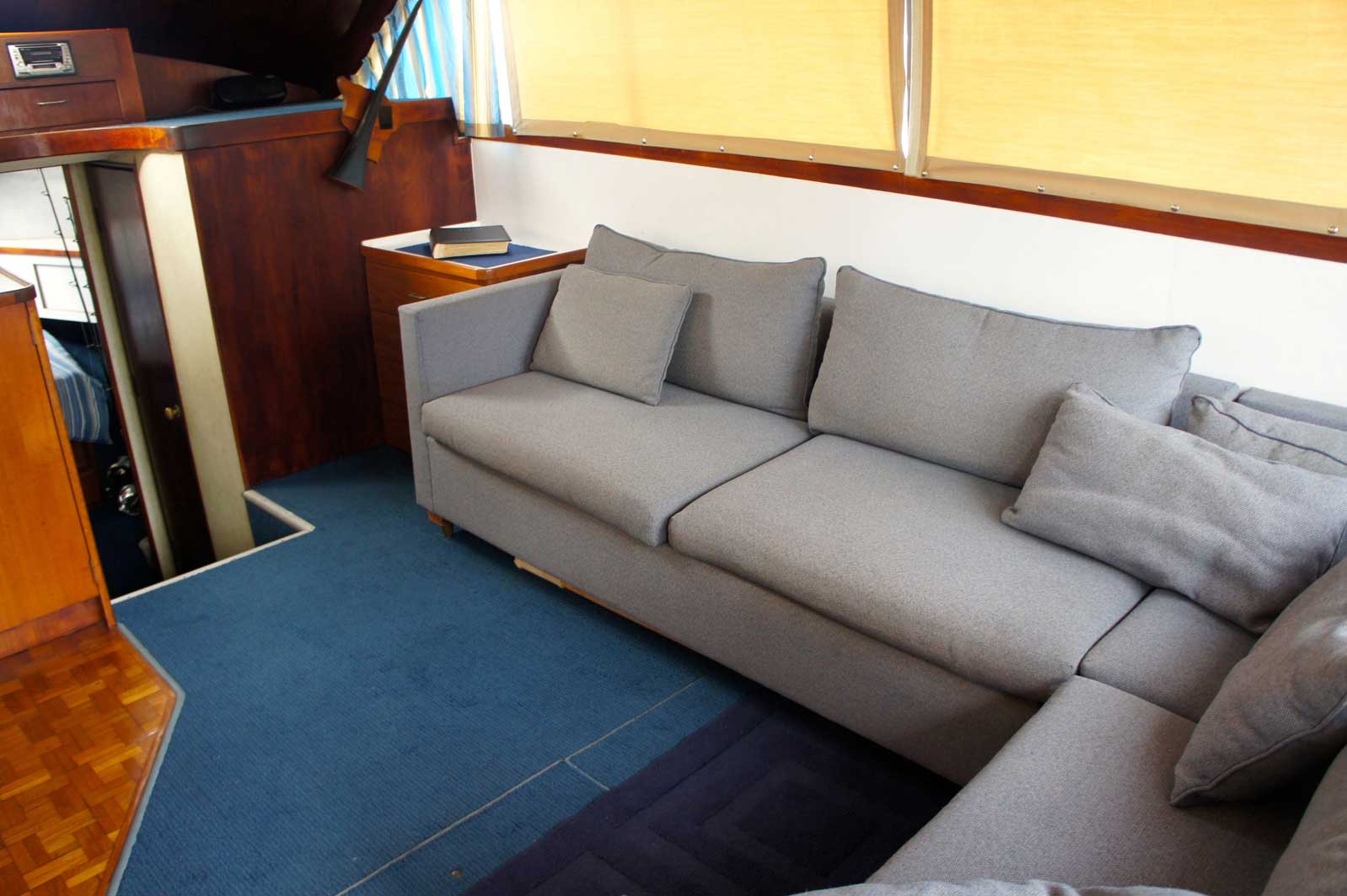 A living room with a couch and a window