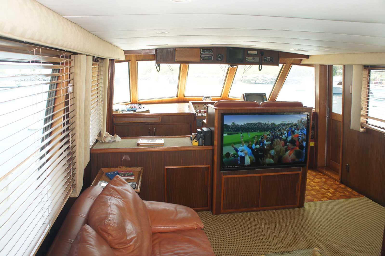 A living room with a couch and a flat screen tv