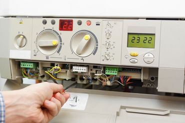 Furnace repair being performed in West Seneca, NY