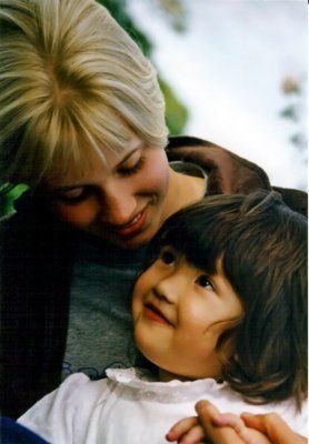 child smiling at adult