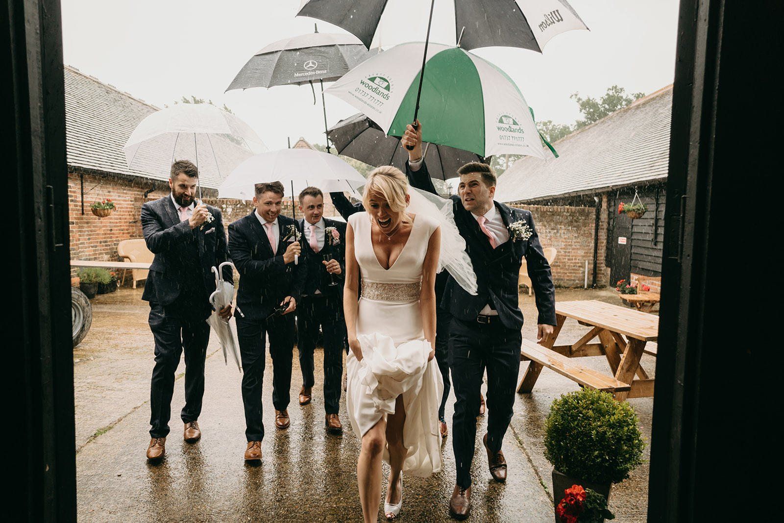 canid wedding photograph bride with umbrella