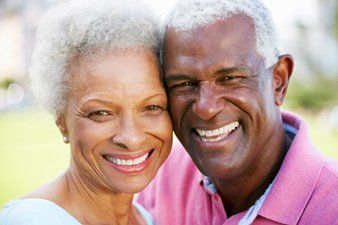 old married couple smiling
