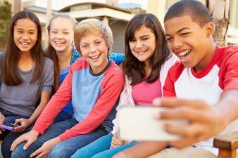 kids taking selfies