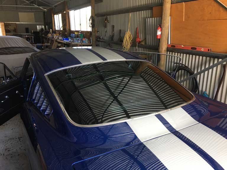car with race strip and tinted window