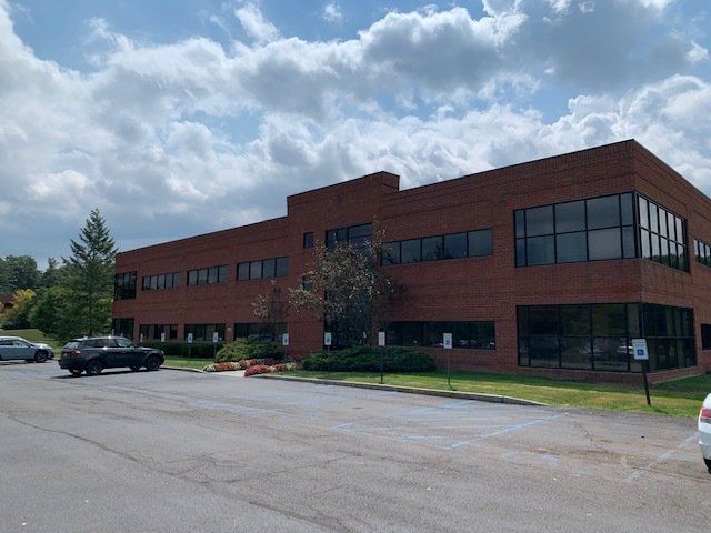 Financial Retirement Planning — Large Maroon Building in Latham, NY