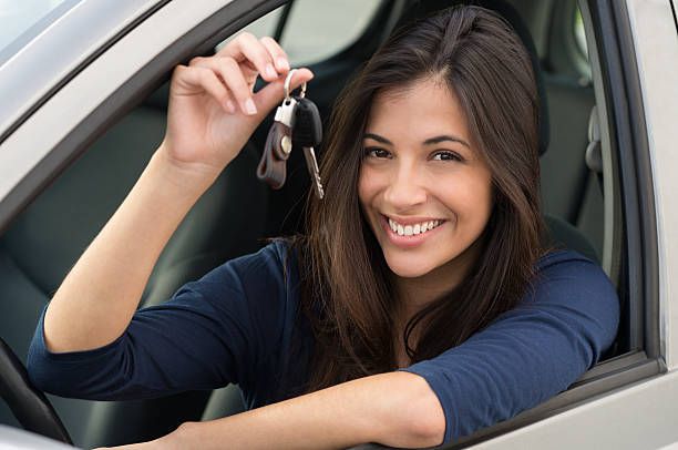 Teen in Car Holding Keys