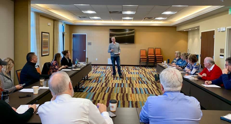 the best accident attorney in Denver, Co Joe Lapham discuss car insurance with Brighton Business Builders