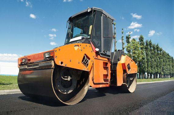 Road Roller Laying Asphalt — Gresham, OR — Tarmac Paving, LLC Road Roller Laying Asphalt — Gresham, OR — Tarmac Paving, LLC
