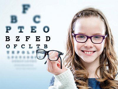 Girl Holding Glasses - Eye Exams in Methuen, MA Girl Holding Glasses - Eye Exams in Methuen, MA