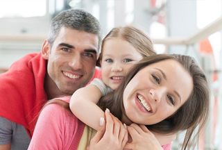 Young Happy Family - Dental Services in Erie, PA Young Happy Family - Dental Services in Erie, PA