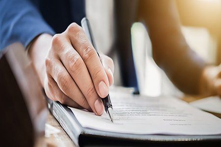 Full Service Insurance — Pen Pointing To The Papers in Pierce FL Full Service Insurance — Pen Pointing To The Papers in Pierce FL