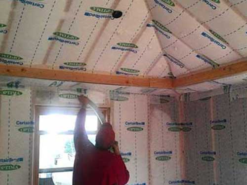 Man Spraying Foam Insulation — Insulation in Tangent, OR