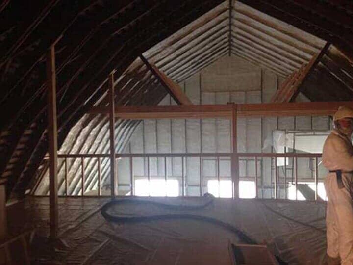 Worker Installing Insulation System — Insulation in Tangent, OR Worker Installing Insulation System — Insulation in Tangent, OR