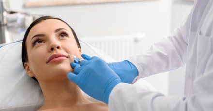 Women's Health Center — Doctor Using Syringe To Patient in Laredo, TX