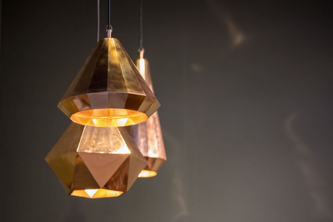Lampadari geometrici in ottone