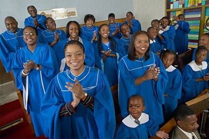 Portrait of a Gospel Choir Clapping Their Hands in a Gospel Service - Burial Services in Brooklyn, NY
