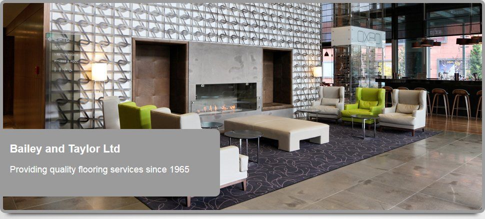 For commercial flooring specialists in Rochford call 01702 417 578 vinyl flooring in a lobby with a seating area