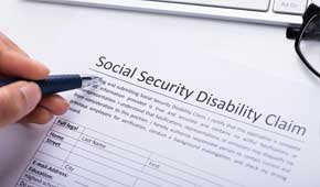Disability - Hand Writing on a Form in Skokie, IL Disability - Hand Writing on a Form in Skokie, IL