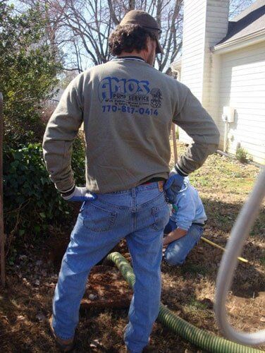 Well Pump Repair — Amos Staff Shirt in Cumming, GA