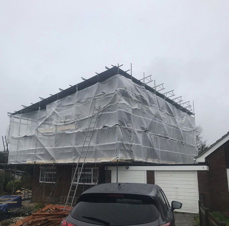 large house with scaffold with a garden 1