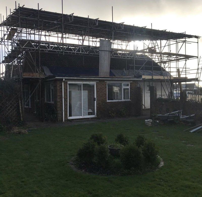 large house with scaffold with a garden 2