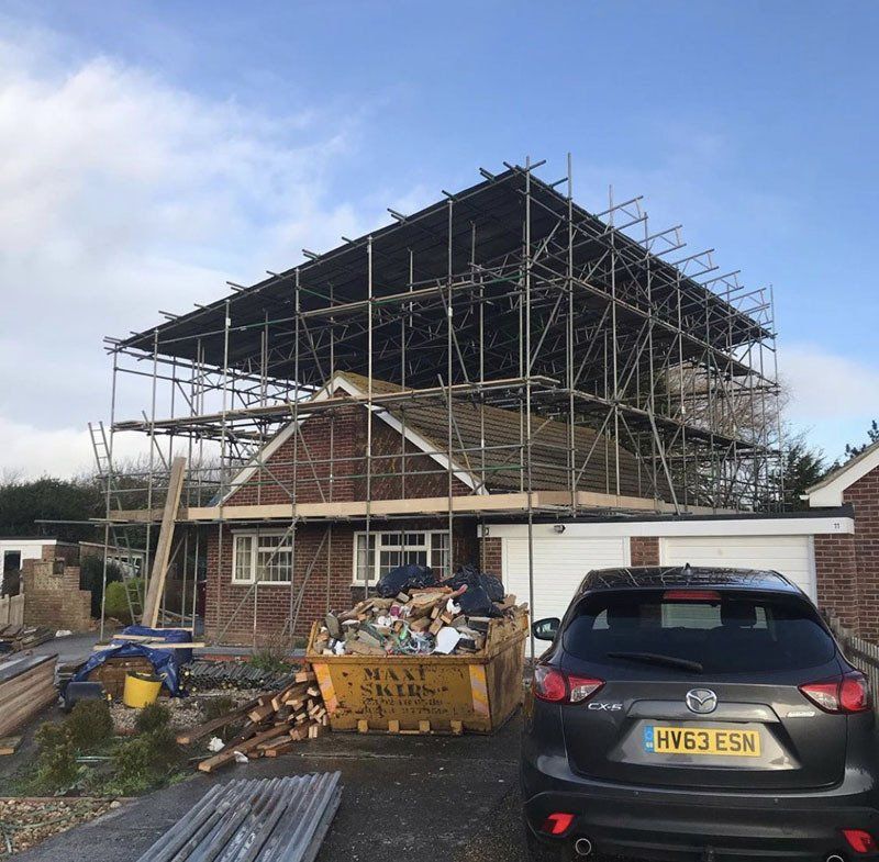 large house with scaffold with a garden 3