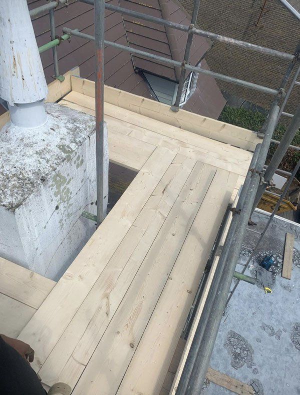 large house with scaffold with a garden 6