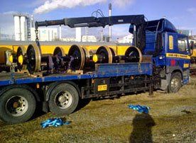 blue coloured flatbed transporter
