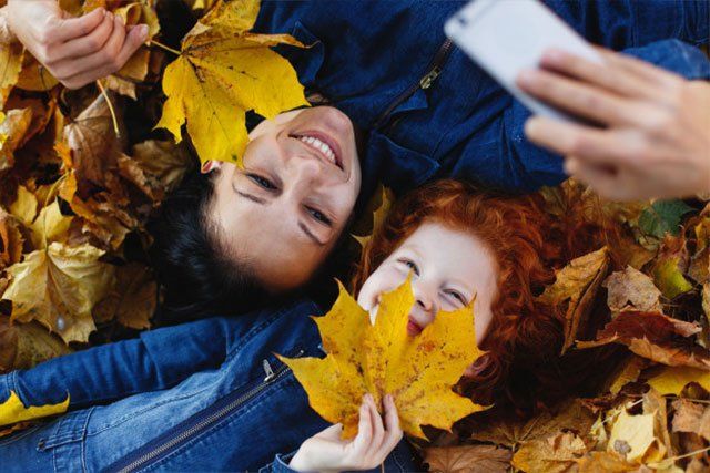 mother and her daugther taking picture
