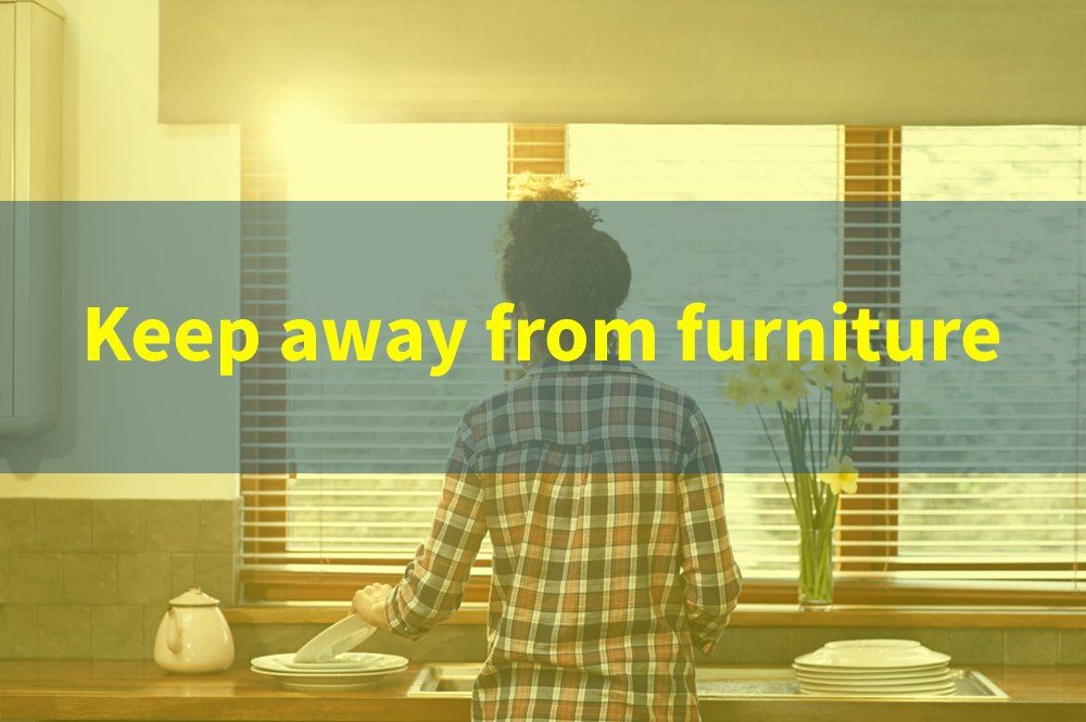 reminder to keep the blinds away from furniture