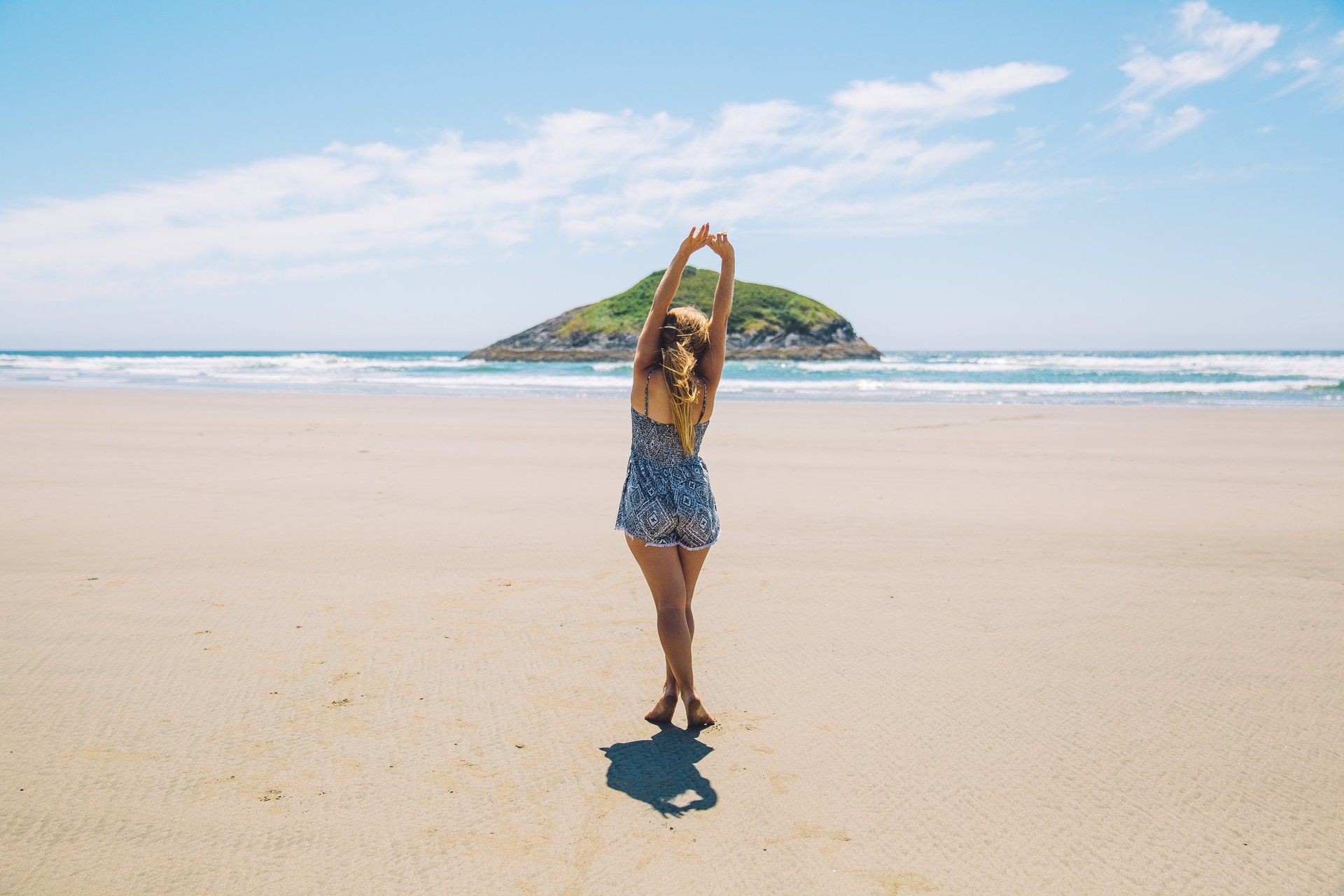 woman enjoying the sun on the beach