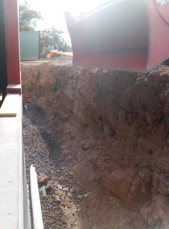 10. Soakaway pipe installed and drainage stone laid on top