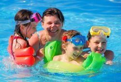 Happy Family in Pool - Town and Country Swimming Pools in Phillipsburg, NJ Happy Family in Pool - Town and Country Swimming Pools in Phillipsburg, NJ